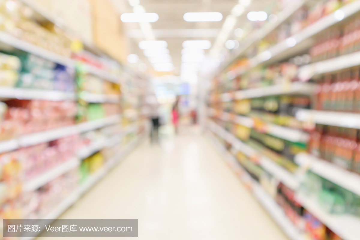 超市过道与顾客模糊散焦产品货架内部散焦光背景